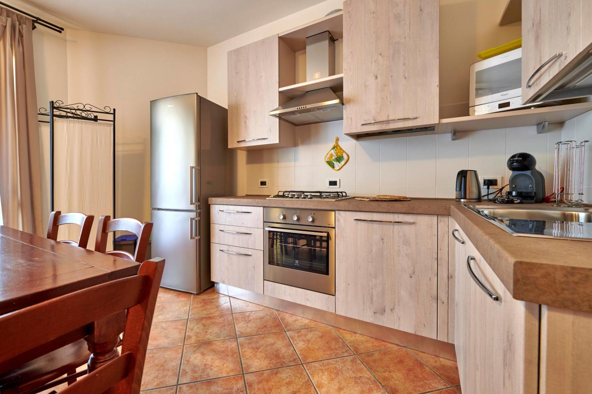 Apartmentsgarda - Baia D'Argento Residence Костермано Экстерьер фото